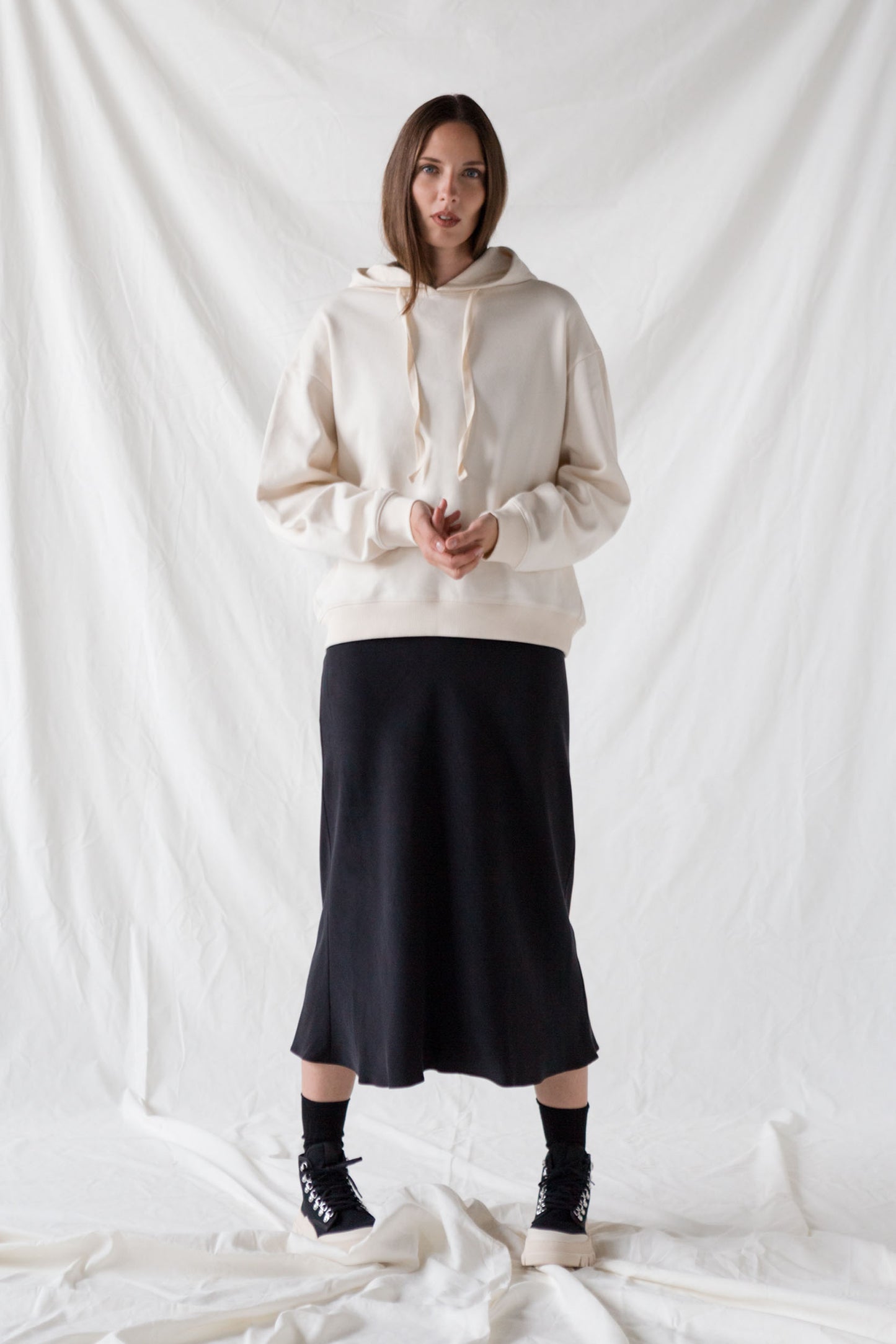 Black tencel slip dress and cream hoodie