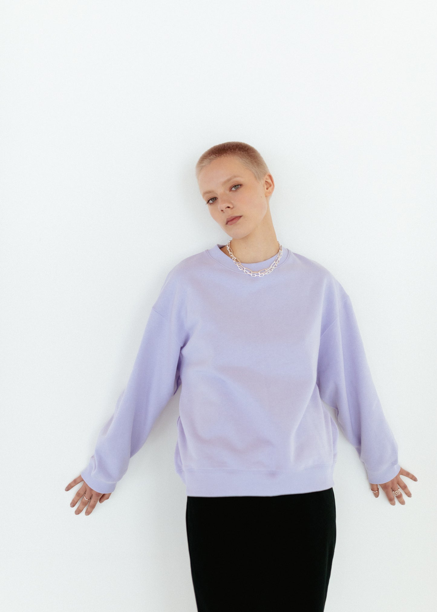 Icy lilac oversize sweatshirt and black workwear trousers