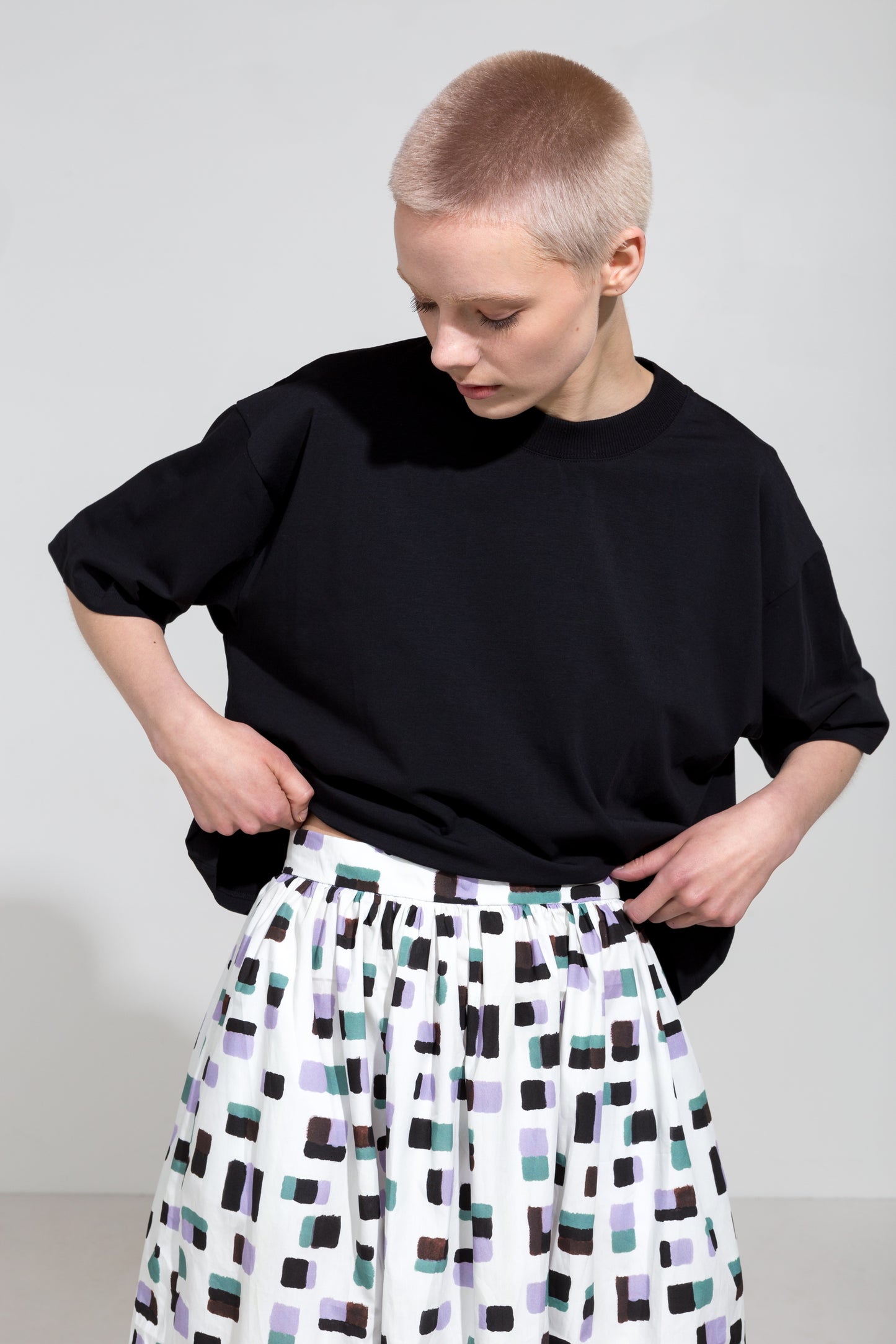 Black organic t-shirt and midi skirt in print