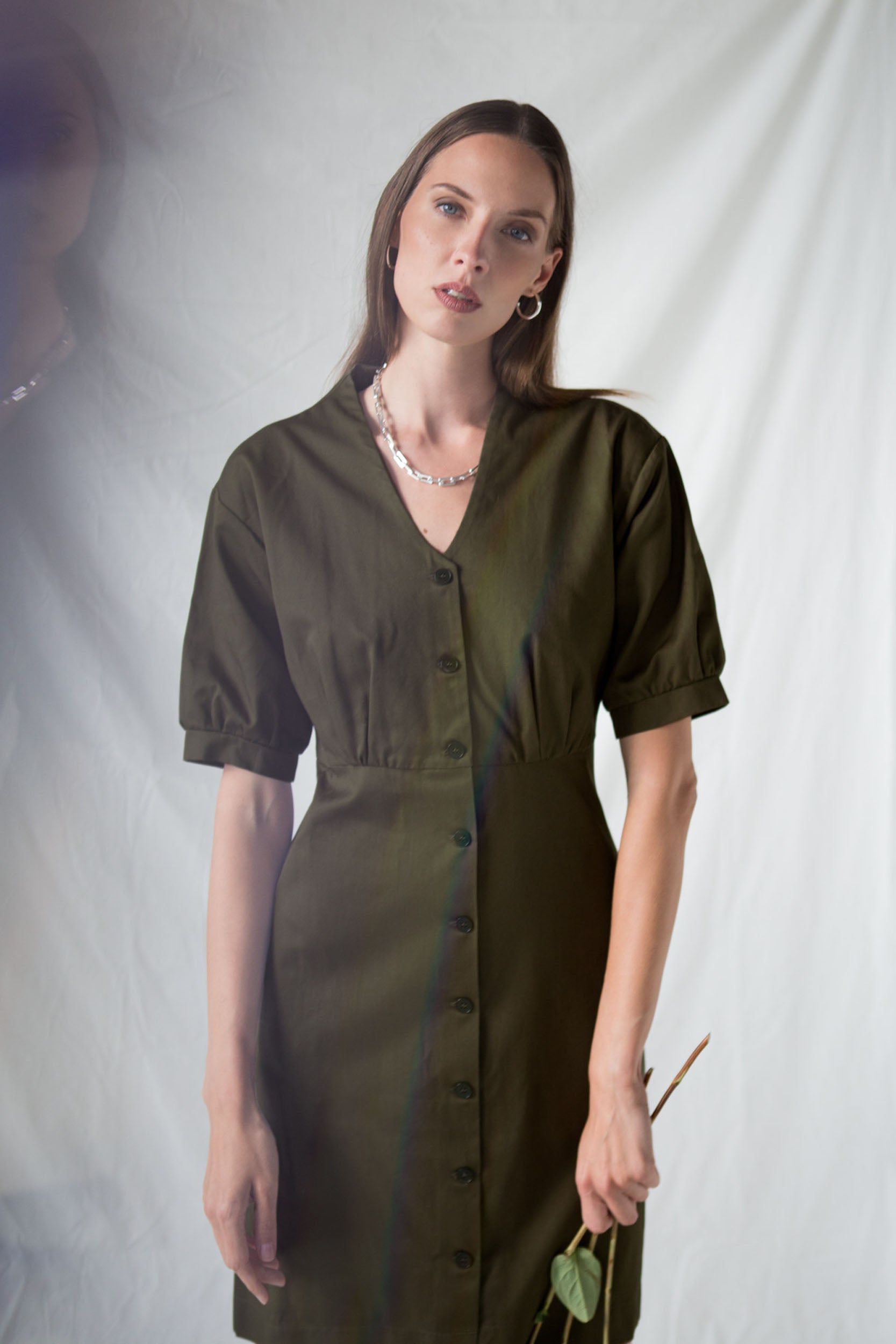 Dark green organic cotton dress with puff sleeves