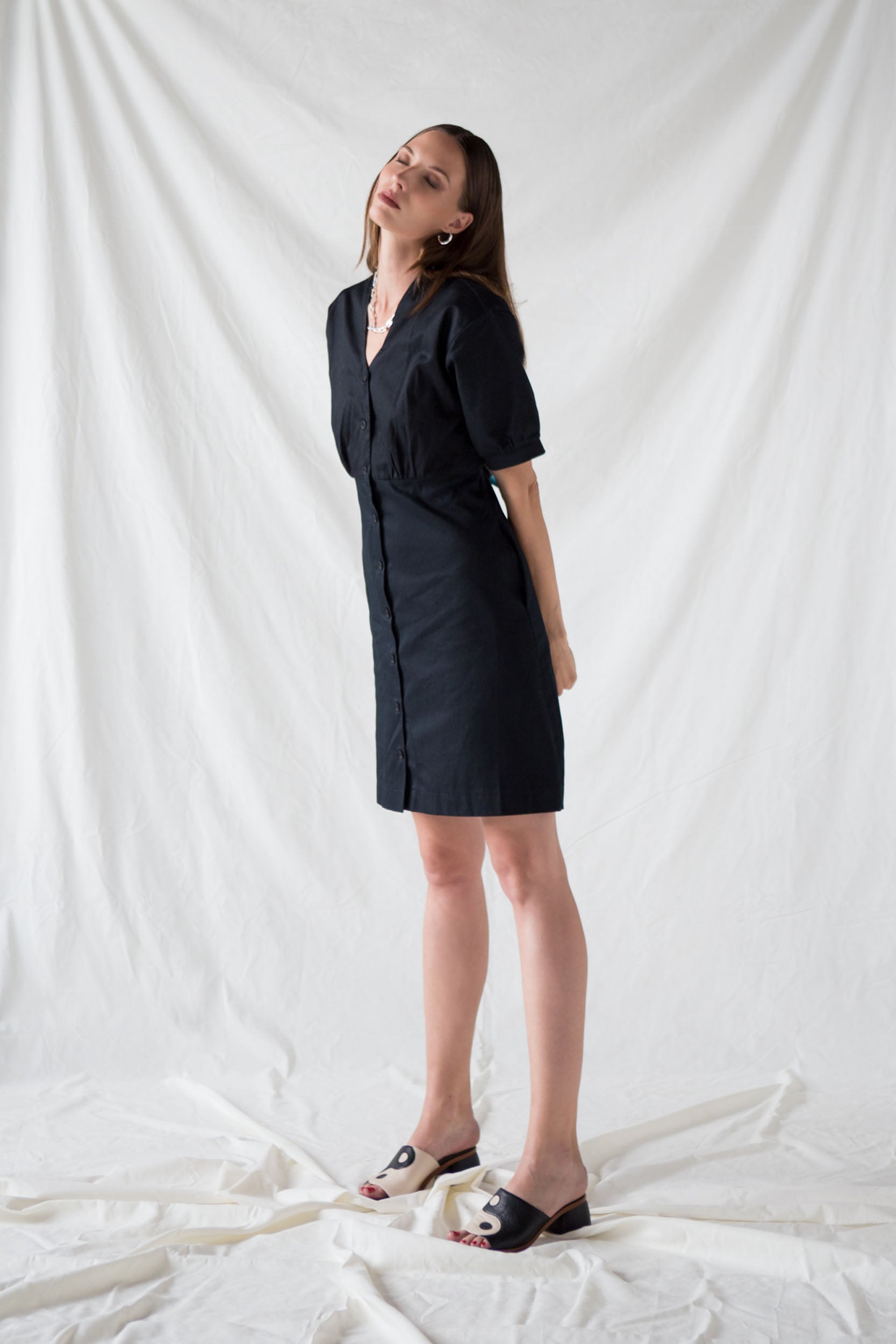 Black organic cotton mini dress with puff sleeves