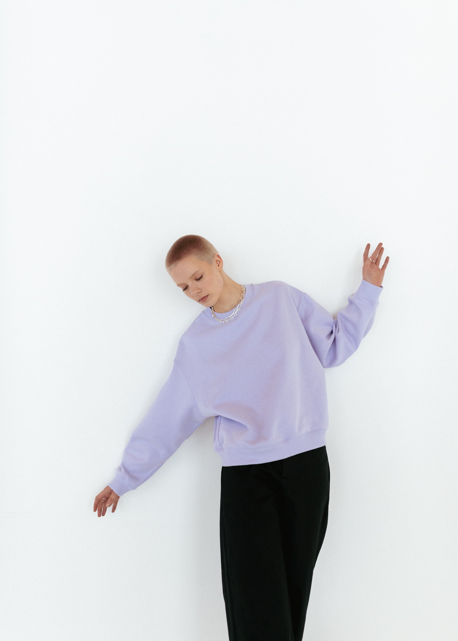 Icy lilac oversize sweatshirt and black workwear trousers