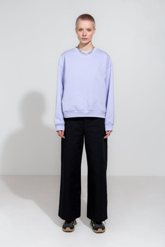 Icy lilac oversize sweatshirt and black workwear trousers