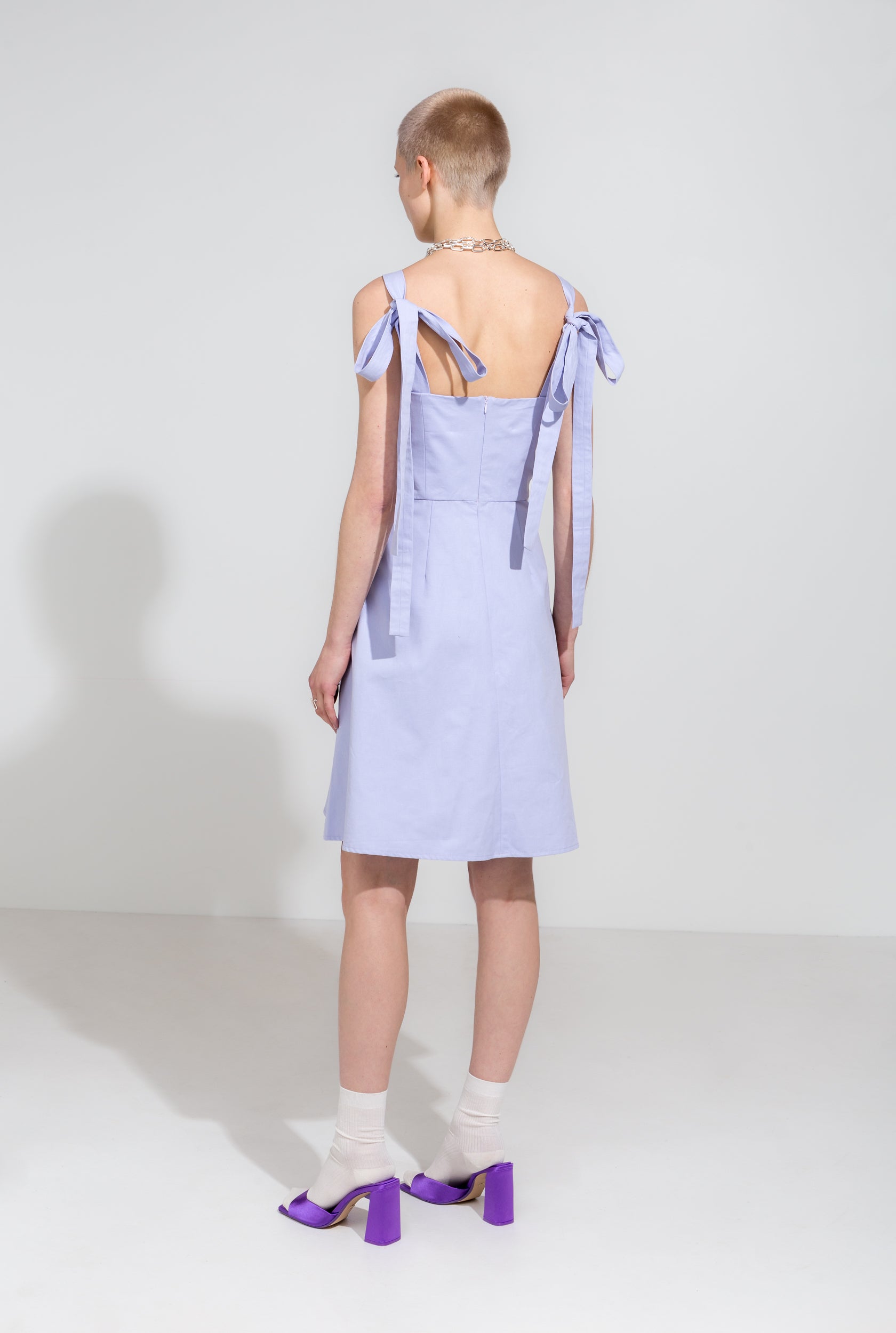 Icy lilac knee length dress with adjustable straps